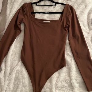 brown aritzia babaton contour long sleeve bodysuit